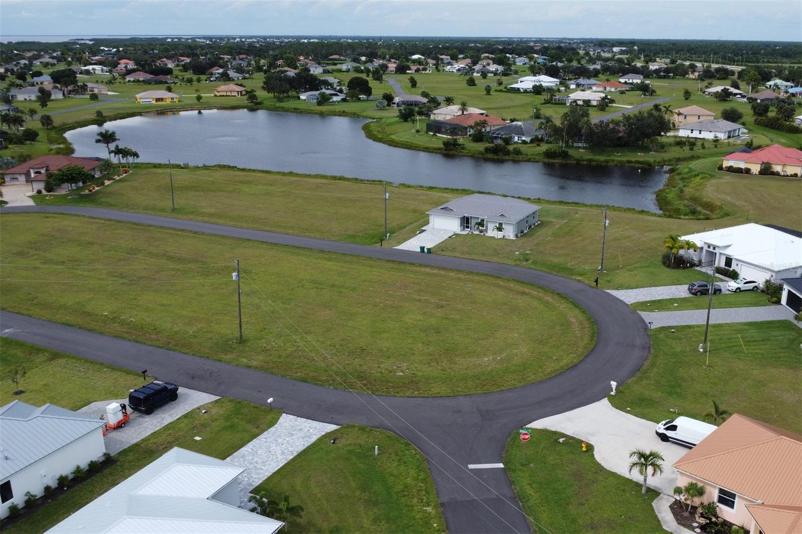Here is the perfect lot for you to build your dream home, amazingly located off Burnt Store Rd in the quiet community of Burnt Store Lakes close to restaurants and shopping. Pick between southwestern or northeastern exposure. Take your golf cart to the first hole. Adjacent lot is 17481 Vellum Cir is for sale, seller wants package purchase. Seller will consider Short Term Financing depending upon Terms, Offer and Qualified Buyer. Burnt Store Lakes is a beautiful deed-restricted community with many new construction homes currently being built throughout the community. As a Burnt Store Lakes resident, you can leisurely kayak on the lakes and enjoy the multitude of tropical birds and wildlife that share this naturalistic setting! Enjoy Burnt Store Lakes' amenities of park with playground or the new kayak/canoe launch which leads to Charlotte Harbor where you easily observe the wildlife. Golf, Marina, Activity Center, Fitness Center and Restaurants can be enjoyed at next door neighboring Burnt Store Marina, which is SW Florida's immediate harbor access, full service, deep water marina. With Burnt Store Road widening to four lanes, downtown Punta Gorda is easily accessible and there you will find a plethora of in-town activities, restaurants and convenience to enjoy.