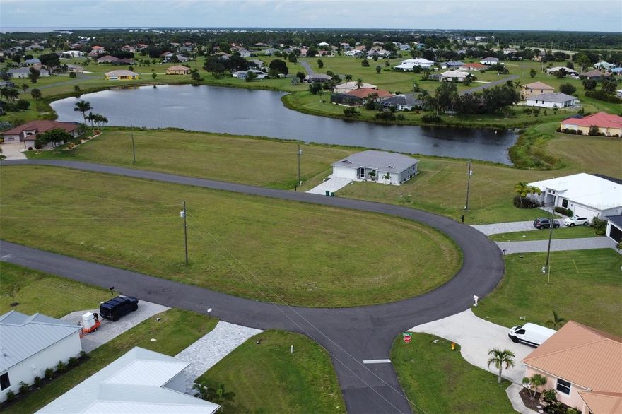 Here is the perfect lot for you to build your dream home, amazingly located off Burnt Store Rd in the quiet community of Burnt Store Lakes close to restaurants and shopping. Pick between southwestern or northeastern exposure. Take your golf cart to the first hole. Adjacent lot is 17481 Vellum Cir is for sale, seller wants package purchase. Seller will consider Short Term Financing depending upon Terms, Offer and Qualified Buyer. Burnt Store Lakes is a beautiful deed-restricted community with many new construction homes currently being built throughout the community. As a Burnt Store Lakes resident, you can leisurely kayak on the lakes and enjoy the multitude of tropical birds and wildlife that share this naturalistic setting! Enjoy Burnt Store Lakes' amenities of park with playground or the new kayak/canoe launch which leads to Charlotte Harbor where you easily observe the wildlife. Golf, Marina, Activity Center, Fitness Center and Restaurants can be enjoyed at next door neighboring Burnt Store Marina, which is SW Florida's immediate harbor access, full service, deep water marina. With Burnt Store Road widening to four lanes, downtown Punta Gorda is easily accessible and there you will find a plethora of in-town activities, restaurants and convenience to enjoy.