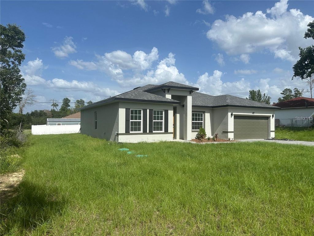 Photo of 417 Marion Oaks Lane, Ocala, FL 34473 (MLS # O6388494)