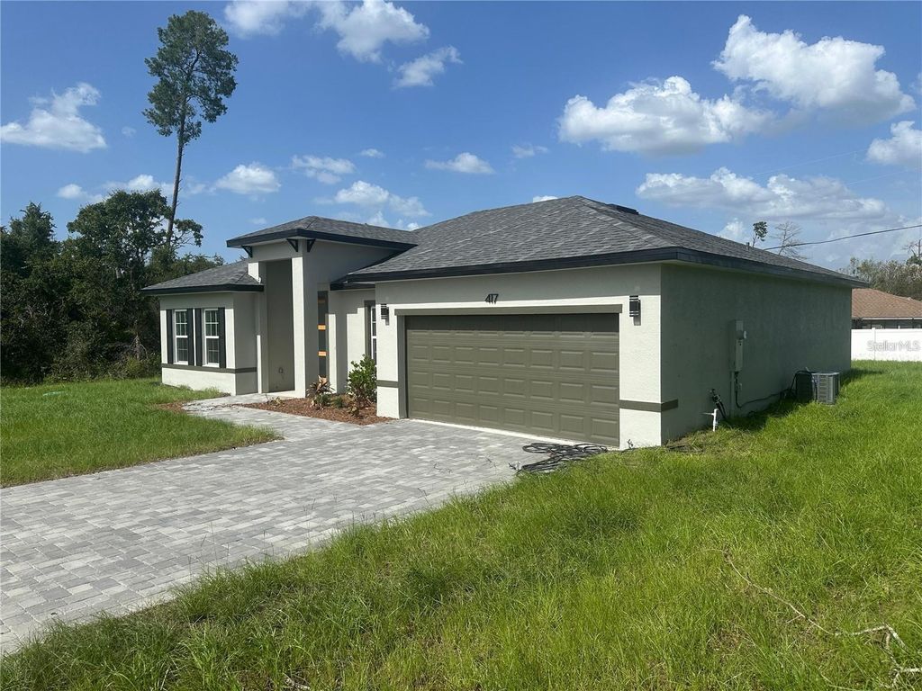 Photo of 417 Marion Oaks Lane, Ocala, FL 34473 (MLS # O6388494)