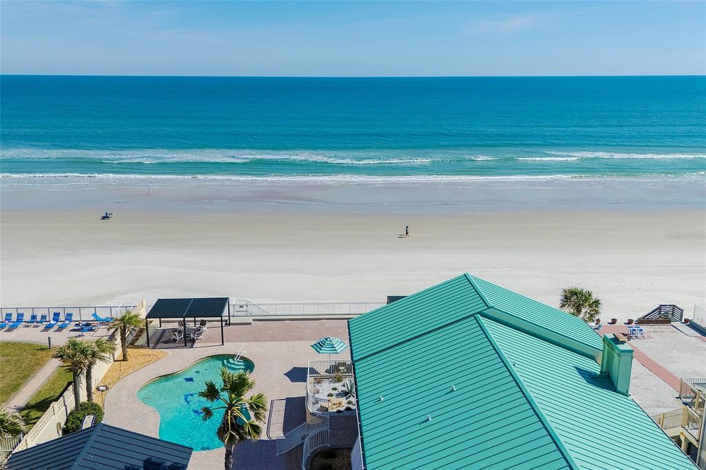 Photo of 3837 S Atlantic Avenue, Daytona Beach, FL 32118 (MLS # NS1087721)