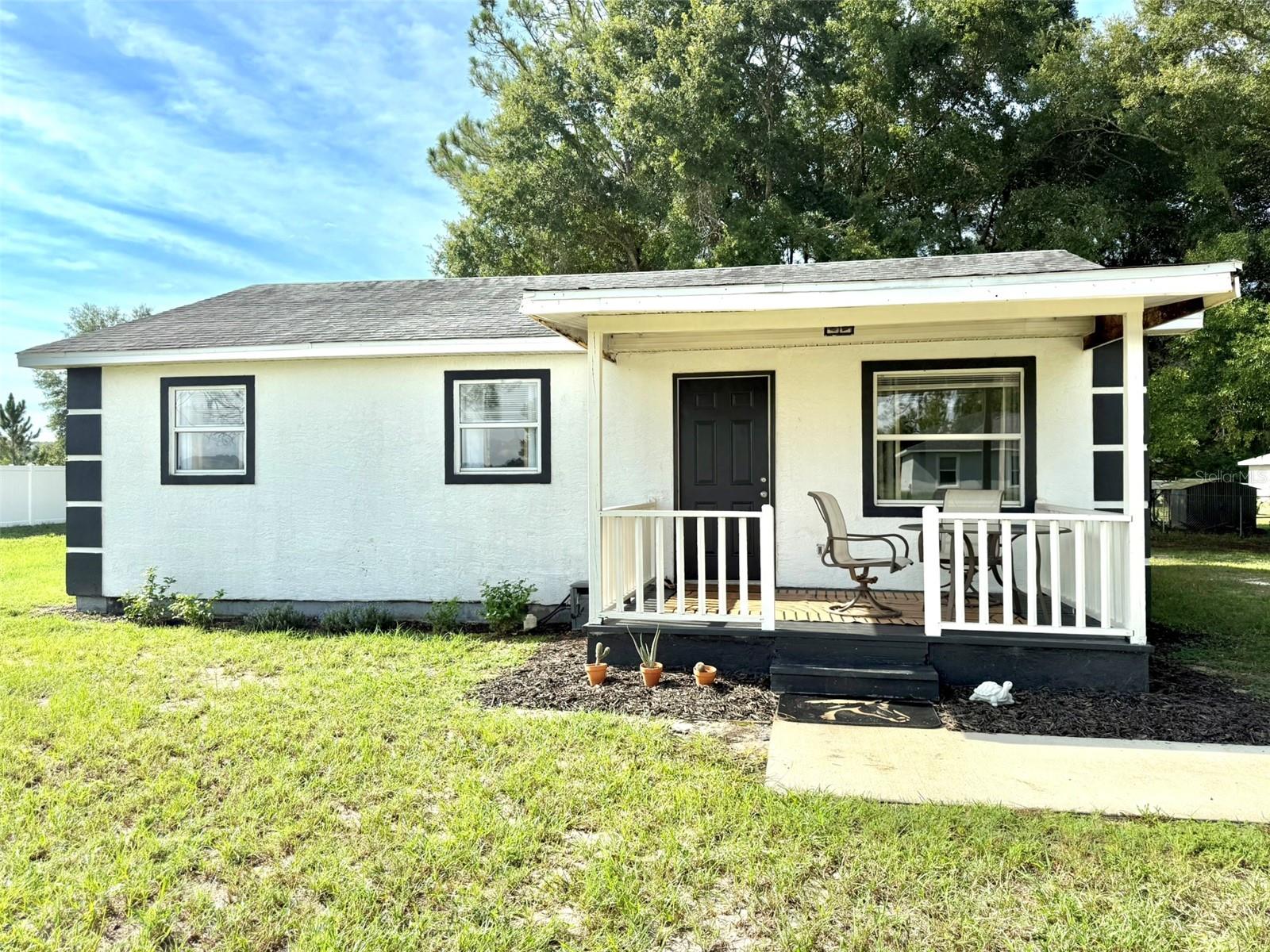 This super cute 3-bedroom, 1-bathroom home is move-in ready and full of charm! Step inside to find new flooring throughout, an updated kitchen and bathroom, Water Heater, and all new lighting and ceiling fans that give the home a fresh and inviting feel. The exterior is just as impressive with freshly painted trim, manicured landscaping, and a very clean overall presentation that makes this property truly stand out. This home sits on half an acre of perfectly nice land. This home also has a storage shed as well! located just 10 minutes from Rainbow Springs and only minutes from the World Equestrian Center, you’ll enjoy both comfort at home and convenience to some of the best attractions Central Florida has to give. This is a cash-only sale due to the roof’s age for insurance purposes; however, the roof is in good condition with no leaks or problems. The owner is a licensed real estate agent. Don’t miss your chance to own this super cute home in a great location with so many updates already done!