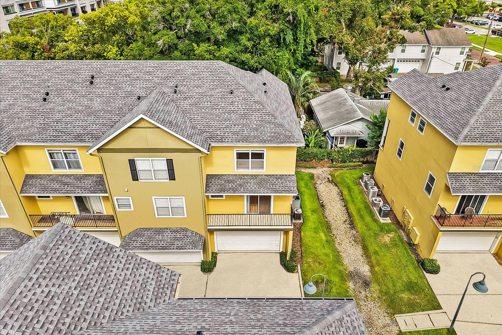 Discover this move-in ready private END-UNIT townhome perfectly situated in the heart of Orlando’s vibrant SoDo neighborhood. Enjoy the ultimate in walkability with SuperTarget, Foxtail Coffee, TJMaxx, Planet Fitness, and countless shopping and dining options just steps from your door. Plus, you're minutes from downtown Orlando, Orlando Health, and major highways including I-4 and the 408, making commuting a breeze.
Inside, this spacious townhome offers a flexible, open-concept layout ideal for today’s lifestyle. The first floor features a versatile den—perfect as a home office, guest space, or even a third bedroom—along with access to the ATTACHED TWO-CAR GARAGE providing secure and convenient parking.
Upstairs on the second level, you’ll find a bright dining area with a private balcony, a modern kitchen with new luxury vinyl flooring that flows seamlessly into the expansive living room—also opening to a balcony nestled among mature trees for exceptional privacy.
Retreat to the top floor, where two generous ensuite bedrooms await, each offering large walk-in closets and brand new plush carpeting.
RECENT UPGRADES (2025) include fresh, top-to-bottom Interior Paint, Luxury Vinyl flooring (LVP) in the main living areas, and NEW carpeting in all bedrooms, making this home truly move-in ready.
As an added bonus, this property is zoned for top-rated schools: Blankner K-8 and Boone High School.
Don’t miss this opportunity to own a stylish, low-maintenance townhome in one of Orlando’s most dynamic neighborhoods. Schedule your private showing today!