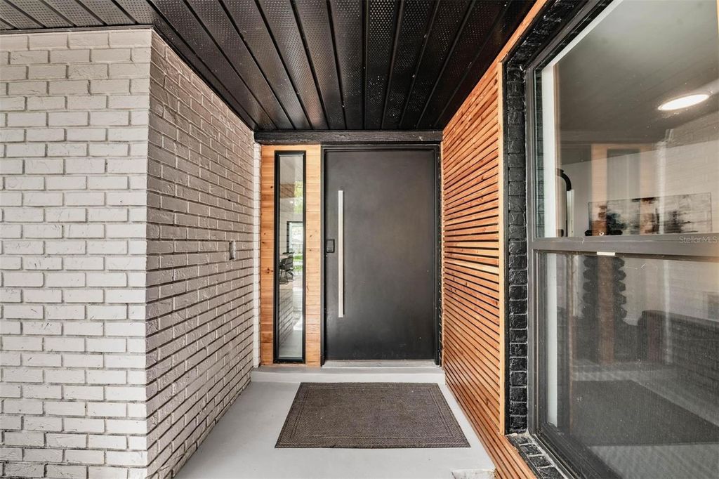 Photo of 848 Hillside Drive, Palm Harbor, FL 34683 (MLS # TB8501725)