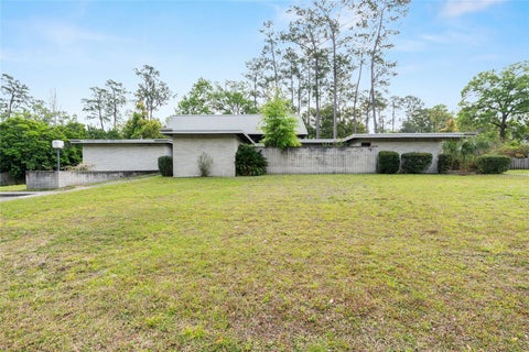 Photo of 1931 NW 32nd Terrace, Gainesville, FL 32605 (MLS # GC540986)