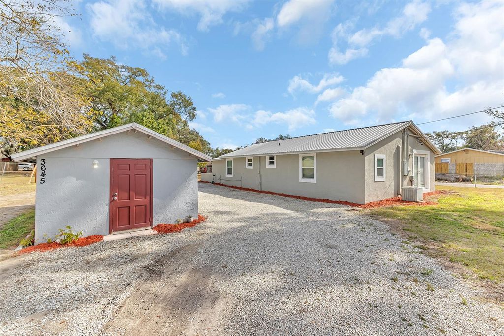Photo of 2121 Woodland Drive, Apopka, FL 32703 (MLS # O6374822)