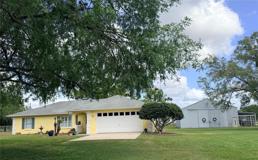 SELLER IS MOTIVATED — DON'T MISS THIS OPPORTUNITY! 
Inviting new ownership to discover this tranquil slice of Florida country living in the highly sought-after community of Summerfield. 
This pristine, move-in ready 3BD/2BA home is nestled on a fully fenced 3-acre parcel, offering the perfect blend of privacy, functionality, and freedom. A solar-powered electric gate welcomes you into this peaceful mini-farm retreat, ideal for equestrian enthusiasts, hobby farmers, homesteaders, or anyone seeking extra space and a quieter lifestyle. The property features an impressive 60x40 metal barn equipped with water, electric, and both 220/110 outlets, providing endless possibilities for livestock, workshops, storage, or recreational hobbies. The thoughtfully cross-fenced acreage includes two horse stalls, a chicken coop, and expansive open land perfect for gardening, additional animals, RVs, trailers, or outdoor recreation. Inside, you'll find bright, sun-filled living spaces, fresh designer-inspired neutral finishes, updated lighting, and a functional open floor plan designed for both comfortable living and effortless entertaining. This meticulously maintained home showcases true pride of ownership with major upgrades already completed for peace of mind, including; 2018: entire home replumbed, water softener installed, hot water heater replaced, and exterior hot water access added. 2025: brand-new HVAC system, all new ductwork, updated ceilings throughout main living areas, fresh interior paint, and stylish urban farmhouse lighting fixtures. Enjoy the serenity of country living while being just minutes from the quintessential World Equestrian Center (WEC), the premier Florida Horse Park, shopping, dining, medical facilities, recreation, and The Villages, offering the perfect balance of peaceful seclusion and everyday convenience. Whether you're looking to create a private homestead, or simply escape to your own country oasis, this exceptional property is truly turnkey and ready for its next owner and chapter. Schedule your private showing today and imagine the lifestyle waiting for you here. This is more than a home..it’s a lifestyle.