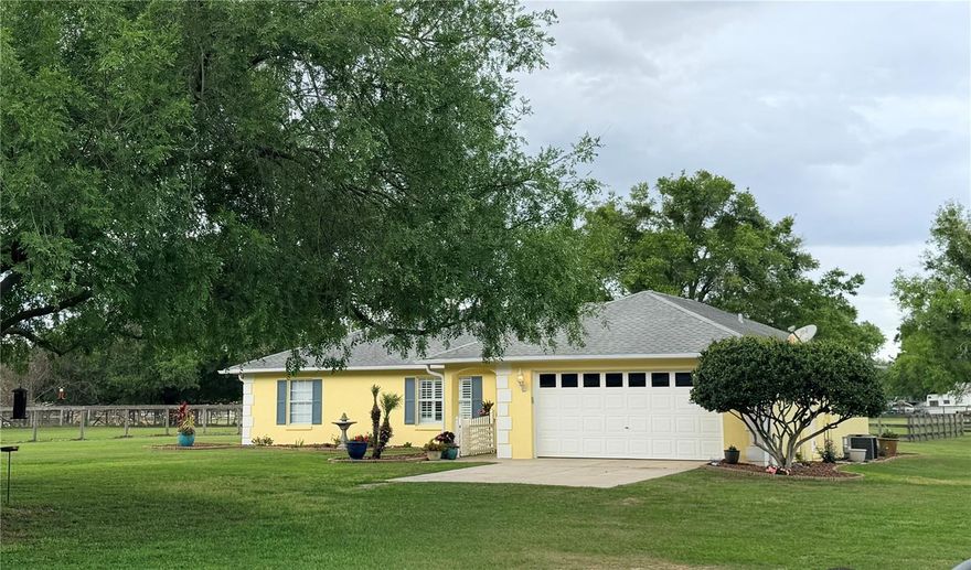 Leave the noise behind and step into a tranquil slice of Florida country living in the highly desirable community of Summerfield. This pristine, move-in ready 3BD/2BA home s nestled on three-acre fully fenced in parcel, offering privacy, and versatility. A solar/electric gate entrance sets the tone as you arrive at this peaceful mini-farm retreat. Perfectly suited for equestrian enthusiasts, hobby farmers, or anyone craving space and freedom. The property features a massive 60x40 metal barn complete with water, electric, and 220/110 outlets. The thoughtfully cross-fenced acreage includes two existing horse stalls, a chicken coop, and ample open space ideal for livestock, gardening, or recreational vehicles. Inside, the home welcomes you with sun-filled open living spaces, enhanced by fresh neutral finishes. a thoughtfully designed floorplan for both comfortable daily living and effortless entertaining. Every inch of this meticulously maintained home reflects careful pride of ownership and quality upgrades, offering peace of mind to the next owner. Enjoy the calm and beauty of rural surroundings while remaining just minutes from shopping, dining, healthcare, recreation, and the Villages, providing the perfect balance of seclusion and convenience. Recent notable upgrades and improvements. (2018) entire home, all new plumbing, water softener system installed, hot water heater replaced, hot water access outside. (2025) new HVAC system install, all air ducts replaced and updated, ceilings updated throughout bedrooms, living room, kitchen, and dining room, fresh interior paint in designer inspired neutral tones, and stylish urban farmhouse lighting fixtures. Whether you're looking to establish a homestead, downshift into a slower pace of life, or secure a private country retreat, this exceptional property is truly ready to welcome you home. Schedule your private showing today and experience firsthand the comfort, peacefulness, and quiet lifesytle this hidden country oasis has to showcase.
This is more than a home-it's a way of life.