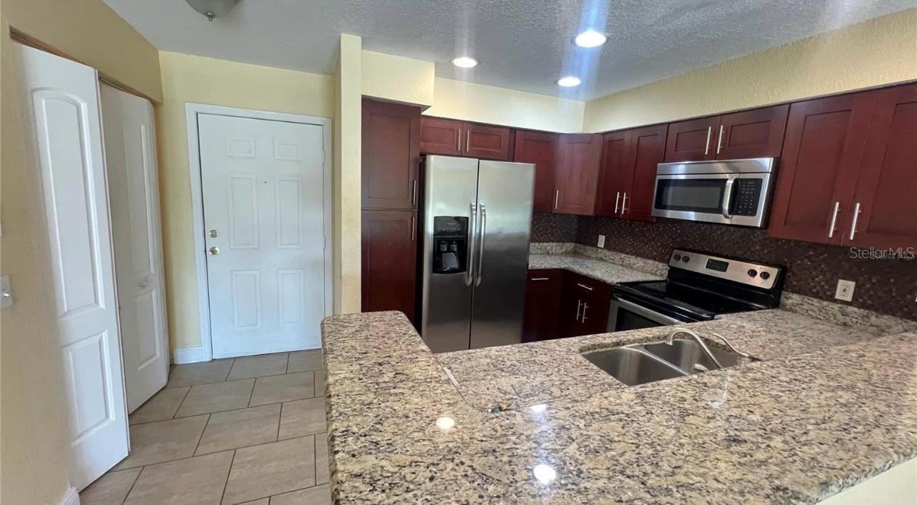 AUDUBON VILLAS AT HUNTERS CREEK CONDO - Residential