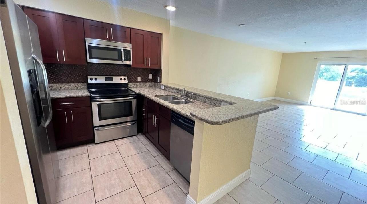 AUDUBON VILLAS AT HUNTERS CREEK CONDO - Residential