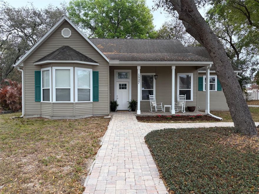 Tucked away on a quiet street, this beautifully maintained, move in ready home is being offered by just its second owners and sits on a .24 acre lot shaded by mature trees in both the front and backyard.

This 1,789 square foot home features 9½-foot ceilings, extra-wide baseboards, transom windows with real stained glass accent adding timeless architectural character. The formal living room serves as a warm gathering space, highlighted by a gas fireplace. The flexible floor plan provides multiple areas for everyday living and entertaining.

Recent thoughtful updates include all new flooring throughout — luxury vinyl plank in the main living areas, ceramic tile in the bathrooms, and carpet in two of the bedrooms and formal living room — creating a blend of style, comfort, and durability. The kitchen was refreshed in 2022 with new butcher block counter top, LVP flooring, and recent fresh paint.  The primary bedroom has walk in closet and modern luxurious en suite bath The en suite is a modern retreat, completely remodeled in 2026 with a custom walk-in shower, updated vanity with dual sinks and a spacious linen cabinet. Enjoy the convenience of a Nest smart thermostat. Just off the family room is a versatile space that’s perfect for a home office or a child's playroom.

Outside you will find custom decorative concrete paver sidewalks and a welcoming front porch. The oversized 2.5-car rear-entry garage is equipped a with My-Q garage door opener. This oversize garage provides exceptional storage, workspace, or potential for future conversion possibilities. With no HOA there is added flexibility for vehicles, a boat or RV. There is an active termite bond that can be transferred to the buyer for extra peace of mind. Basketball goal does not convey.

Home is currently set up as a 2 bedroom with the original spacious 3rd bedroom serving as the family room. Additionally, the formal living room could easily be converted to a 3rd bedroom while maintaining the family room as the heart of the home. The original blueprints for this custom built home are included.

This move in ready home combines space, character, and meaningful modern updates in a peaceful setting — ready for its next chapter.

Dimensions and square footage are believed to be accurate, Buyer to verify.