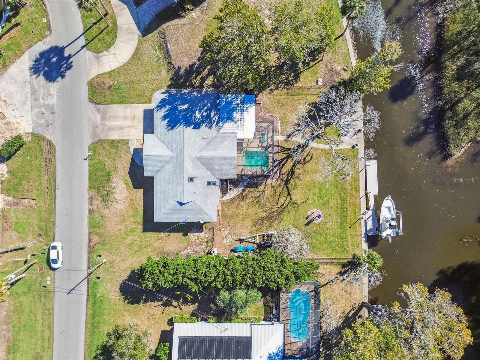 Discover the perfect waterfront lot for your dream home! This .33-acre property, located in one of Crystal River’s most coveted subdivisions, offers expansive water access with no HOA restrictions. Enjoy easy boat access to the Gulf, renowned for excellent fishing and scalloping. Highlights include: Peaceful backyard privacy with manatees often visiting.***Existing bulkhead in excellent condition (replacement value $50-70k).***New, convenient city water and sewer lines in the surrounding roadways/easements.***A fully operational boat lift, dock, full fencing, and a lovely pool with screened-in enclosure.***Proximity to waterfront dining and Citrus County’s natural beauty.***This property provides a large footprint for a new build.*** Don’t miss this rare opportunity for waterfront living! Seller says "Make an offer!"