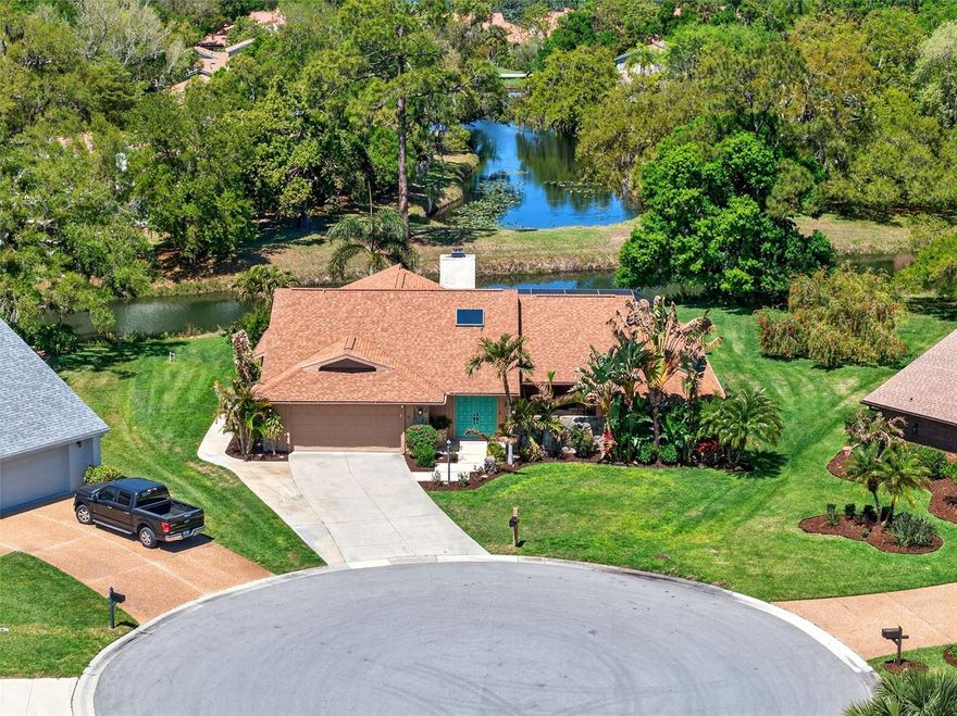 Welcome to 4964 Candlebush Circle in Bent Tree, a beautifully updated single-family home ideally positioned at the end of a quiet cul-de-sac on an oversized lot. This property offers the perfect blend of privacy, comfort, and Florida living. Inside, you’ll find a spacious split floor plan with high ceilings and lots of natural light. Tile flooring flows throughout the home, and the recently renovated bathrooms feature modern finishes, sleek fixtures and contemporary designer touches.  Step outside to your private outdoor oasis, complete with a sparkling pool and expansive lanai overlooking 2 ponds, perfect for relaxing or entertaining while enjoying tranquil water views and local wildlife. This home has been meticulously maintained with major upgrades already in place, including hurricane impact windows(2024), roof (2018), AC system (2022), AC duct work(2017) and a whole-home water filtration system. Located in the gated community of Bent Tree, known for its mature oak trees, scenic lakes, and natural beauty, this home is located within highly rated school districts and just a short drive to UTC shopping and dining, Siesta Key beaches, and Downtown Sarasota.