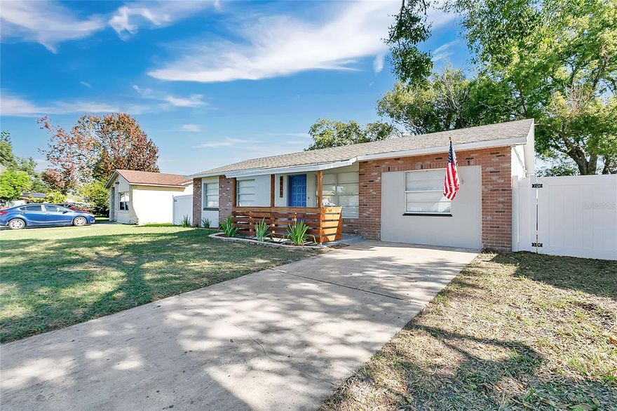 Welcome to a home that has been completely updated and curated for effortless, modern living. This 4-bedroom, 1.5-bathroom property, spanning 1,269 square feet, features fresh landscaping and a striking curb appeal with painted brick accents, a new wood entry railing, and a vibrant blue front door. Step inside to a bright, cohesive interior featuring fresh interior paint and durable, beautiful Luxury Vinyl Plank (LVP) flooring that flows seamlessly throughout the entire home. The renovation is centered around the stunning kitchen, which boasts high-end features: brand-new stainless steel appliances, quartz countertops, sleek shaker-style cabinets, a stylish tile backsplash, and new recessed lighting. It comes complete with front-loading washer and dryer, which are included with the sale, making the move-in process truly effortless. The entire property features an elegant Oil-Rubbed Bronze fixture package. The flexible layout includes three bedrooms plus a highly functional Flex Space (9’7” x 10’7”) for a home office or media room. Even the bathrooms are brand new, featuring new vanities, toilets, and shower in both the full and half-bath spaces. The property offers unparalleled peace of mind with major systems updates already complete: the A/C system is only 3 years old, the roof is 9 years old, and a newer hot water heater is installed. The entire electrical system has also been updated. The transition to the outdoor living space is seamless, made inviting by French doors that lead to the massive screened porch (24’7” x 14’5”). This expansive space overlooks the large backyard, which offers complete privacy thanks to new white vinyl fencing and the premium view of the scenic pond/water area immediately behind the property. The surrounding area provides immense convenience. You are located with easy access to Downtown Orlando, Maitland, Winter Park, and major roadways like I-4 and the 417, making commuting simple. Shopping, dining, and local amenities are minutes away, positioning this home perfectly for a convenient and high-quality lifestyle.