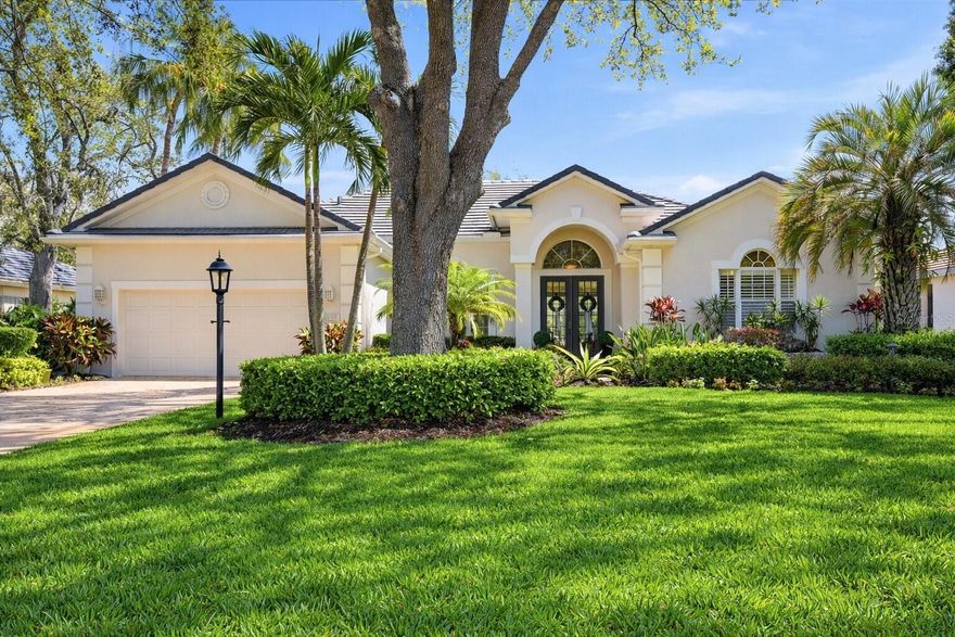 Step into a stunning, light-filled residence where elegance meets effortless Florida living. This beautifully designed home welcomes you with soaring ceilings, graceful architectural arches, and an abundance of natural light flowing throughout the open floor plan.
The inviting foyer opens to a spacious living and dining area, thoughtfully designed for both entertaining and everyday comfort. Expansive windows and French doors create a seamless connection to the outdoors while framing lush tropical landscaping.
The heart of the home is the impressive chef’s kitchen, featuring crisp white cabinetry, premium stainless steel appliances, a gas cooktop, and a large center island with rich, contrasting cabinetry—perfect for gathering and entertaining. The kitchen flows effortlessly into a generous family room with custom built-ins and views of the outdoor living space.
The primary suite is a private retreat, offering generous proportions, serene views, and a spa-inspired bathroom with a soaking tub, walk-in shower, and double vanity. Additional bedrooms and flexible spaces provide options for guests, a home office, or a comfortable den.
Step outside to your private screened lanai and pool area, where indoor and outdoor living blend beautifully—ideal for relaxing or entertaining year-round in a tranquil, tropical setting.
Set on a lushly landscaped lot with mature trees and impeccable curb appeal, this home offers the perfect balance of elegance and comfort. Location: University Park Country Club With its mature landscape and expansive natural beauty, University Park is the premier master-planned community in the Sarasota area. Behind the secured, staffed entrance is an award-winning, resident-owned community featuring 27 holes of four-star-rated golf, eleven lighted Har-Tru tennis courts, four pickleball courts, a fitness center, croquet, miles of tree-lined streets for walking or biking, and first-class dining. The community also offers numerous social activities and clubs designed to suit a wide variety of interests. Located just four miles from downtown Sarasota and its vibrant arts scene, museums, shopping, dining, and top-rated healthcare, University Park provides a peaceful retreat while keeping city amenities within easy reach. A short 15-minute drive leads to some of America’s finest beaches, outstanding outdoor recreation areas—including the internationally renowned Nathan Benderson Park—the Ringling Museum, a variety of boating opportunities, and the acclaimed St. Armands Circle. University Park’s breathtaking beauty is unmatched, offering a rare opportunity to own a home in one of Sarasota’s most desirable communities.