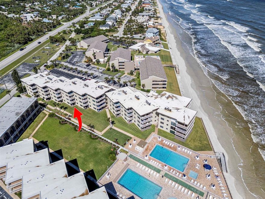 After Four Generations of one family sharing fun filled memories and loving on this beach home, here it is: A Unique Opportunity to own a GROUND FLOOR, Ocean Front 3 Bedroom 2 Bathroom Condominium Residence on New Smyrna Beach's NO DRIVE BEACH! Beautifully furnished & Decorated. Thoughtfully renovated. All Impact Doors and Windows new in 2023. A/C new in March 2025. Water Heater New in October 2025. "Ball Valve" and copper piped Main Water Shut Off New in October 2025. Both Bathrooms completely gutted and renovated in September 2025 - both feature high end finishes & fixtures, grab bars, comfort height toilets and solid wood vanities w/ stone counter tops. The Spacious Living Area is Open and filled with light. All windows graced with Plantation Shutters. The sliders feature a solar roll up shade to allow the light in while protecting your privacy. Well equipped kitchen with counter and stools for expanded eating space. Dining and Living Areas open directly to the private patio, community lawn and allow for immediate access to the ocean front pool, kiddie pool, sun deck and stairs to the beach. The Spacious Primary Suite enjoys a King Bed w/ new luxury mattress, Southern light, Smart TV and an ensuite bathroom with easy access shower and grab bars. Bedroom #2 offers two twin beds. Bedroom #3 offers a Queen Bed. B-101 comfortably sleeps six people. The Seaward Association completed an exterior/concrete restoration in 2025. There are no Special Assessments at this time.  The Saxon Drive "corridor" is a special community of classic NSB condominium complexes where generations of families, from near and far, have built shared memories unique to wide beaches, great surf and inviting ocean breezes. Seaward B-101 enjoys a full size washer and dryer in the residence. Additionally, B-101 enjoys a dedicated storage cage in the community storage room for keeping safe and out of sight your beach chairs and toys. Seaward also offers a community laundry area. Ample Parking is not to be taken for granted, and Seaward enjoys two parking lots for residents, renters and guests. B-101 is offered furnished. There is also a locked off "Owner's Closet." A great "Turn Key" opportunity. Please see attached Disclosures. Please note some art depicted in the virtual tour and photos is excluded and does not convey. Please see notes in Photos, and Seller to provide list of any excluded items within 3 days of contract. All measurements are approximate, and Buyer is responsible for verifying all dimensions. Check out the photos and Virtual Tour! Located near The National Seashore Park, JB's Fish Camp, Baker's Table, Mi Mexico and a quick drive to Publix and all the Flagler Avenue shops, restaurants and pubs, you'll love the convenience. Located approx. a mile from the closest public parking lot and public beach access, you'll also love the privacy and uncrowded beach.