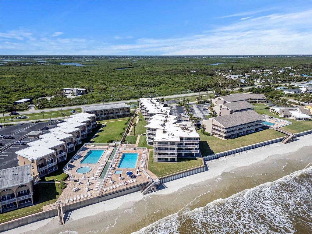 Photo of 4811 Saxon Drive #B101, New Smyrna Beach, FL 32169 (MLS # O6366905)