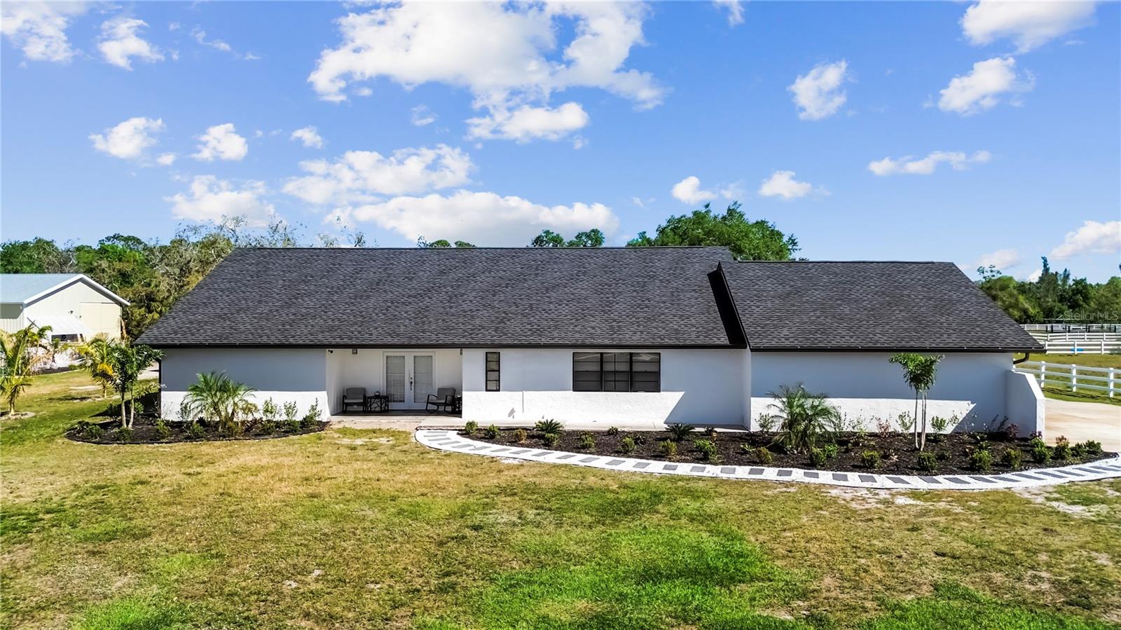 REDUCED TO SELL FAST!!! Motivated Seller Accepting Offers!! Approx 1.50 Acres!! NO HOA!! NO FLOOD INSURANCE! A stunning Pool residence designed for both luxurious family living and seamless entertaining. This meticulously maintained home boasts spacious 5 bedrooms and 3 beautifully appointed bathrooms, featuring soaring cathedral ceilings with an open, airy ambiance. The interior is adorned with high-quality ceramic tile and wood flooring, lending a refined yet durable touch throughout. The thoughtful split floor plan makes it ideal for multigenerational living—providing privacy for in-laws or guests while keeping everyone connected. Outside, a pool and spa set the scene for year-round relaxation and lively gatherings. Conveniently located West of I-75 for easy travel.
This home features a brand-new roof, soffits, and gutters. The spacious lot offers ample room for your Boat, RVs, and all your toys!— Or simply build a custom workshop or shed! Conveniently located just minutes from some of Florida’s most beautiful beaches and only 25 minutes from Sarasota-Bradenton International Airport, it also provides easy access to Home Depot, Lowe’s, and is within a short distance of an elementary school, high school, and Manatee Technical College. The University Town Center shopping mall is just 15 minutes away. With its prime location and flexible use potential, this property offers excellent opportunity for personal enjoyment or income as a short-term rental such as Airbnb.
Experience the perfect blend of elegance, functionality, and comfort at this one-of-a-kind Bradenton gem!