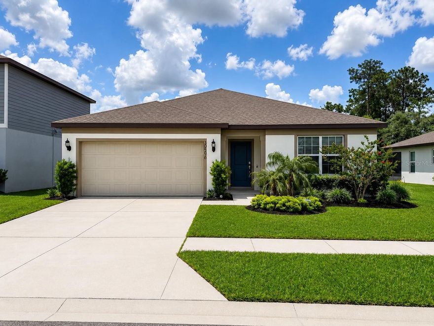 One or more photo(s) has been virtually staged. Welcome to this beautifully built 2022 home located in the desirable gated community of Wesbridge in Wesley Chapel! Offering 3 bedrooms, 2 bathrooms, and 2,164 square feet of heated and cooled living space, this spacious home combines modern construction, functional design, and resort-style community amenities. Situated on a peaceful pond lot, the property features an open-concept floor plan with tile flooring throughout the main living areas, granite countertops in both the kitchen and bathrooms, and a spacious inside laundry room for added convenience. The thoughtfully designed layout also includes a versatile secondary living space at the front of the home, perfect for a home office, den, playroom, media room, or potential fourth bedroom. The large kitchen opens seamlessly to the main living and dining areas, creating an ideal setup for entertaining and everyday living alike. The spacious primary suite offers comfort and privacy, while the additional bedrooms are generously sized. Enjoy relaxing pond views from the backyard while taking advantage of the outstanding community amenities Wesbridge has to offer, including a resort-style pool with waterslide, playground, recreational facilities, dog park, and gated entry for added privacy and security. Conveniently located near I-75, SR-54, shopping, dining, schools, medical facilities, Tampa Premium Outlets, and The Shops at Wiregrass, this home offers the perfect blend of location, lifestyle, and value in one of Wesley Chapel’s fastest-growing communities.