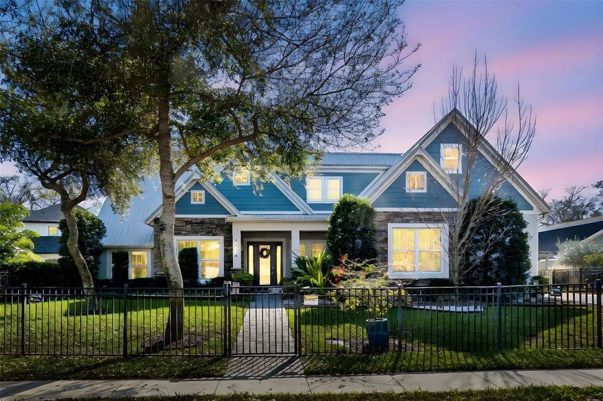 Welcome to an exceptional custom residence in the heart of Tarpon Springs—where modern luxury, energy efficiency, and Florida lifestyle come together seamlessly. Built in December 2020 and situated in desirable Flood Zone X, this 4 bedroom + office, 3.5 bath home offers 3,287 heated square feet of thoughtfully designed living space with an oversized 2-car garage and no HOA restrictions.

From the moment you enter through the dramatic cathedral-style foyer, you’ll appreciate the soaring 10-foot ceilings (11’ in the office), elegant 8-foot interior doors, and luxury vinyl plank flooring that flows throughout the home. Designed for both comfort and entertaining, the spacious living area features a wood-burning fireplace with gas starter and expansive sliders that open effortlessly to the resort-style backyard.
The designer kitchen showcases sleek grey soft-close cabinetry, stunning quartz countertops, GE Profile stainless steel appliances, and an undermount stainless sink. Large Pantry w/ butler pantry. This open-concept space flows beautifully into the main living areas, making it ideal for gatherings large or small.

The primary suite is a true sanctuary with double-door entry, generous proportions, and a custom-built walk-in closet. The spa-inspired bathroom offers dual vanities, a soaking tub, and a luxurious walk-in shower complete with body jets and a rainfall shower head—creating a daily retreat experience.

Upstairs, the fourth bedroom includes a private full bath and two storage closets, along with an additional bonus space perfect for a secondary office, media room, playroom, or guest retreat. The home also includes a dedicated office on the main level for remote work convenience.

Additional high-end features include:
• Zoned HVAC system with 5 total zones
• Ultra high-efficiency American Standard 20 SEER variable speed heat pump (2024)
• 22KW whole-house Generac generator
• 220 line for an ev vehicle charger.
• Solar system
• Tankless water heater
• Water softener
• Cat 6 cabling throughout
• Impact-rated double pane windows and doors
• Metal roof
• Dog washing station
• Laundry room with soft-close cabinetry.

Step outside to your private oasis featuring a gas-heated saltwater pool, screened and covered patio, and a fully equipped outdoor kitchen with Blaze gas grill, range hood, wine refrigerator, and bar seating—perfect for year-round entertaining.

Boat enthusiasts will appreciate the covered exterior storage area equipped with water and electric—ideal for boat storage. The property is fully fenced with wrought iron fencing in both front and back yards, complete with irrigation and rain gutters for easy maintenance.

Conveniently located near top-rated schools and just minutes from historic downtown Tarpon Springs, the world-famous Sponge Docks, Lake Tarpon, Sunset Beach, Fred Howard Park beaches, and the Pinellas Trail. Enjoy easy access to shopping, dining, medical facilities, and everything that makes coastal living so desirable.

If you are searching for newer construction with luxury finishes, boat-friendly amenities, high-end mechanical systems, and an unbeatable Tarpon Springs location—this rare offering truly stands apart.

Schedule your private tour today and experience elevated Florida living at its finest. Make sure to view the Walk-thru video and Landing Page for more photos and information!