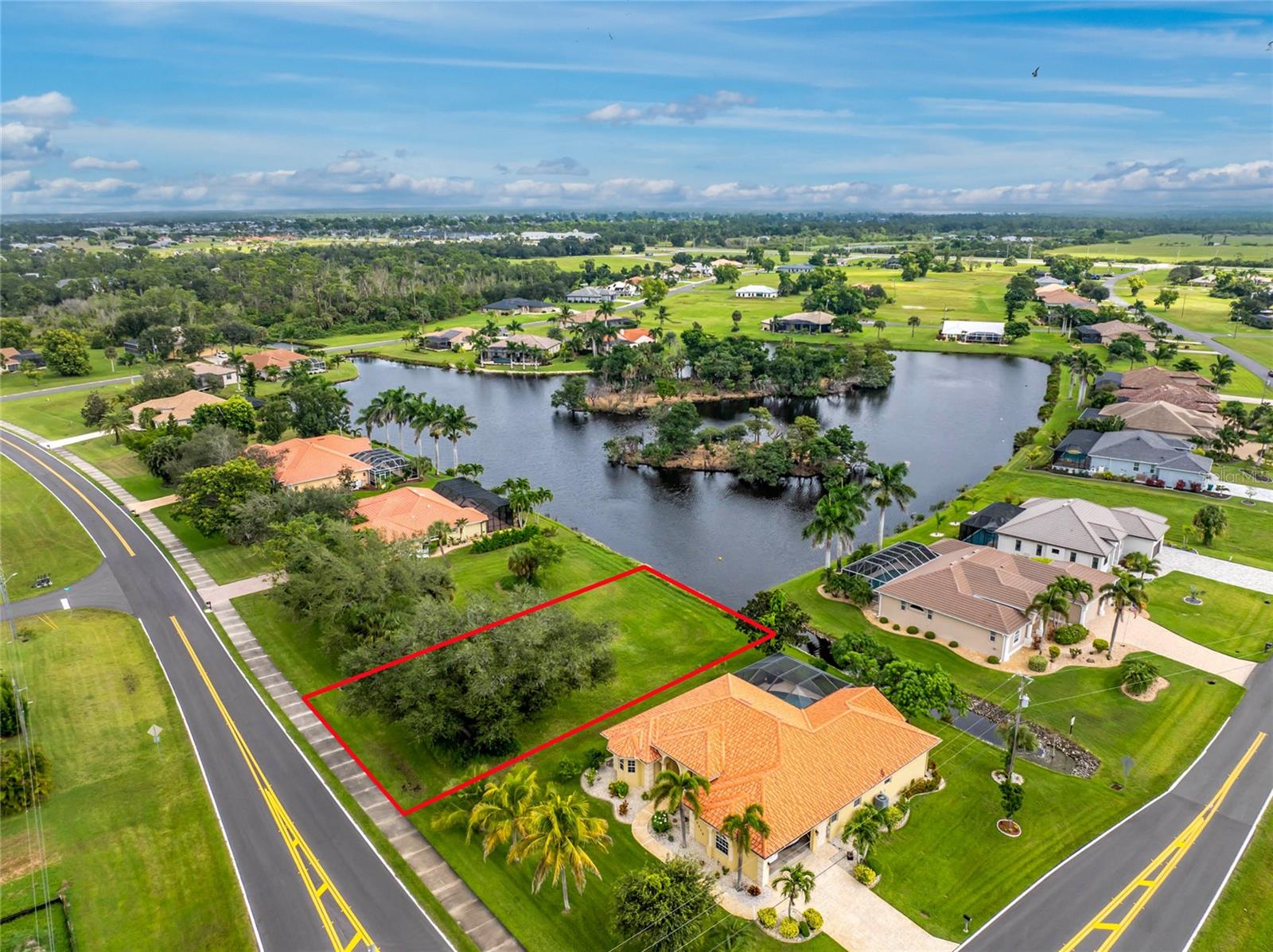 Don't let this one-of-a-kind Lakefront lot pass you by. Located in the beautiful Burnt Store Lakes, this lot features a southeastern rear exposure view and located on one of the most popular lakes in the community. What makes this locale so special is the lake has center islands that affords additional privacy and is where you will enjoy watching White Ibis flying in to roost there in the evening. This is a regular shaped 80 x 120 lot touting a majestic oak tree and a street sidewalk that is perfect for your leisurely morning or evening strolls throughout the neighborhood. Public utilities are already in place in the Burnt Store Lakes community which makes this lot an exceptional value! Burnt Store Lakes is a beautiful deed-restricted community with many new custom construction homes currently being built throughout the community. As a Burnt Store Lakes resident, you can kayak on one of the many lakes found here and enjoy the multitude of tropical birds and wildlife that share this naturalistic setting! Enjoy Burnt Store Lakes' amenities of park and playground and kayak/canoe launch that leads to Charlotte Harbor where you can frequently observe game fish, manatees, porpoises, and sea turtles! Golf, Marina, Activity Center and Restaurants can be enjoyed at neighboring Burnt Store Marina, which is SW Florida's immediate harbor access, full-service, deep water marina. Downtown Punta Gorda is a short drive where there are plenty of restaurants and town activities to enjoy.