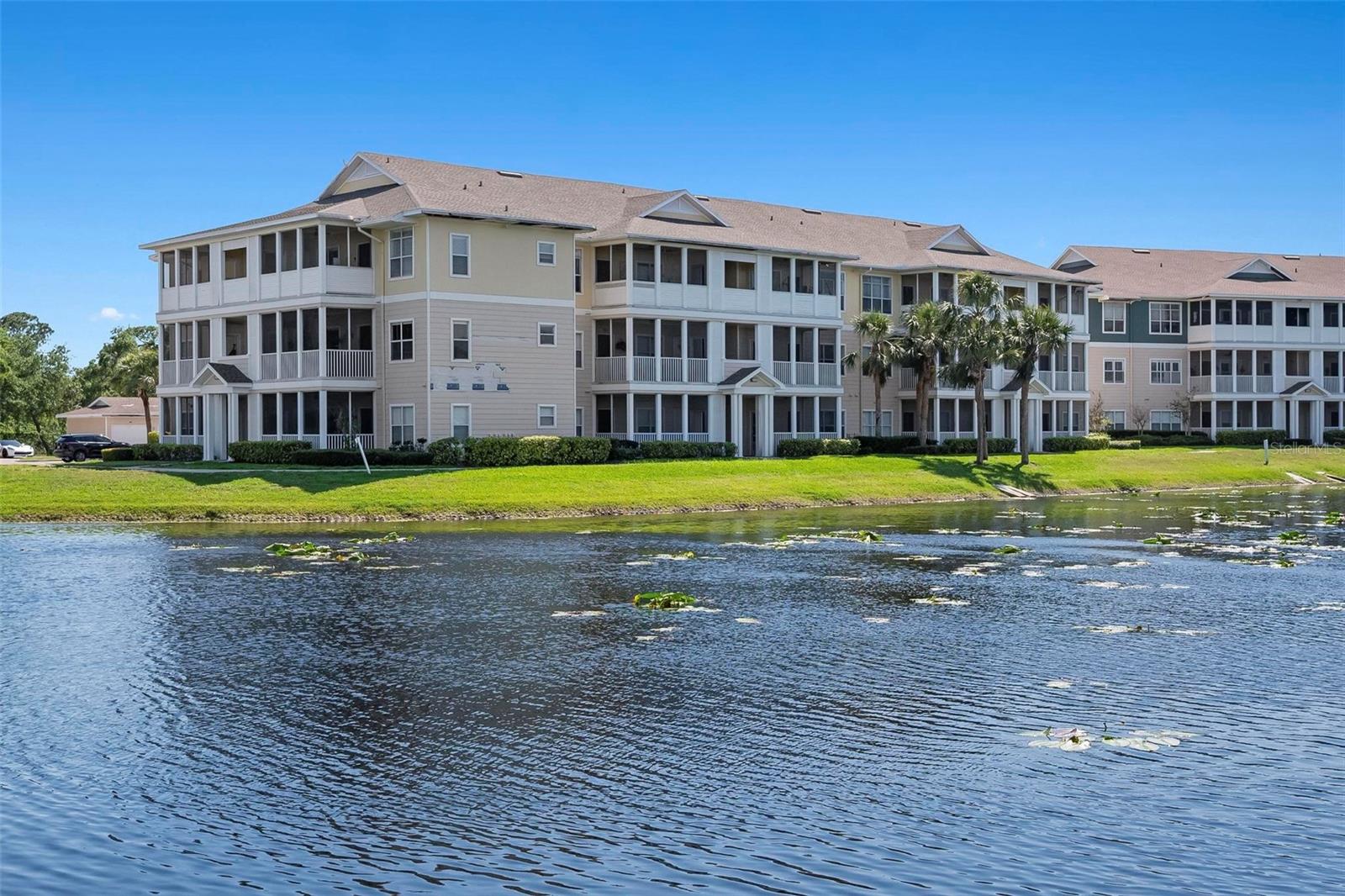 FABULOUS 1st FLOOR WINTER RETREAT CONDO JUST 6 MILES to PRISTINE BEACHES. This exceptionally located heavenly haven is perfect for those cold northern winters, year-round residence or excellent for easy rental investment. The very popular Palms of Cortez luxury community allows for 6-month min. rentals and is pet friendly permitting 1 pet up to 65lbs. The condo is conveniently located walking distance to the sparkling luxury pool, tennis/pickle ball courts, exercise room, clubhouse and gated front entrance. Easy open parking lot, just steps away from the front door making it effortless to carry in your groceries. The incredibly light and bright unit has a spacious open floor plan and 9-foot ceilings offering a big room feel. This impressive residence features: Stylish luxury vinyl plank flooring * New roof in 2024 * Stainless Steel appliances * Painted with top quality Behr Ultra premium paint * 9ft ceilings with crown molding * Wood cabinets with satin finish knobs * Garbage disposal * Fully sized LG washer/dry inside the condo * Generously sized premium bedroom with large walk-in closet * Oversized tub great for relaxing * Ceiling fans * Front entrance coat/storage closet plus porch storage closet great for beach chairs/items * Tastefully decorated and is offered TURN-KEY furnished as an option. The highly sought after Palms of Cortez community offers: Onsite community manager * Gated * Luxury Amenities * Endless sidewalks great for walking or running around * Gorgeous shining lakes with water fountain * Located minutes to golf courses, downtown Bradenton and plenty of shopping including Publix & Walmart super center. Plus, great restaurants including RJ Gators & Anna Maria Oyster bar to name a few. About 15 minutes to Sarasota/Bradenton International Airport and many parks/preserves great for walking around. Enjoy living with all these amazing features before heading out to take a dip in that refreshing pool community pool. You will truly enjoy living in this Bradenton location. Don't miss out, get the keys to unlock your happy home and start enjoying a Florida lifestyle today.
