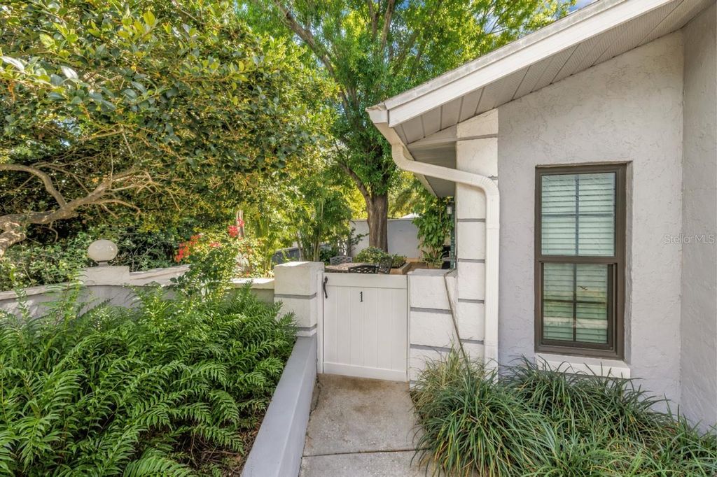 Photo of 5861 Calais Boulevard N #1, St Petersburg, FL 33714 (MLS # TB8495466)