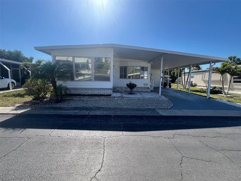 Photo of 13 Pindo Palm Street E, Largo, FL 33770 (MLS # TB8501999)