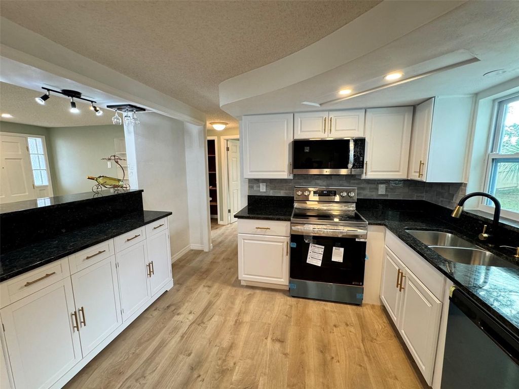 Photo of 4142 Crestfield Avenue, Holiday, FL 34691 (MLS # TB8434320)