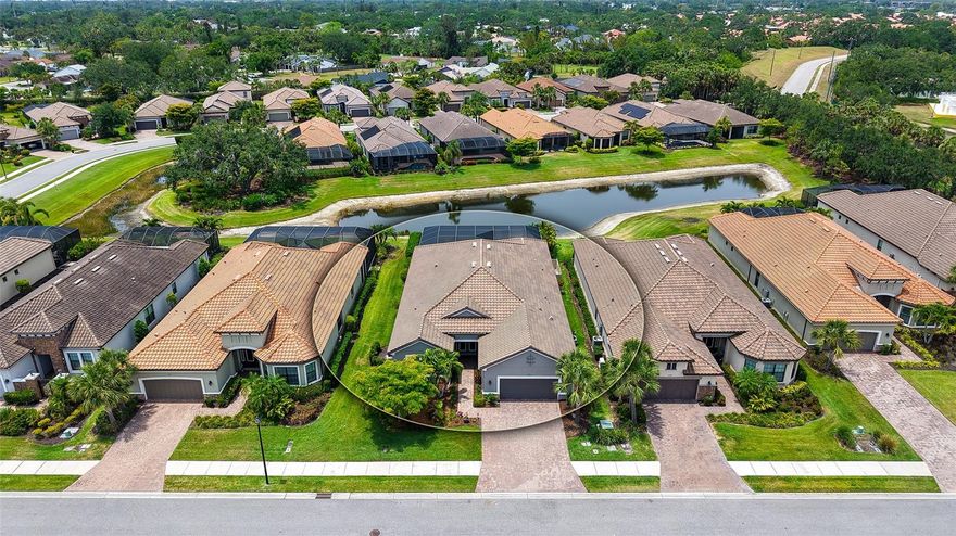 An Elegant Gem is the best way to describe this stunning 4-bedroom, 3-bath executive pool home in the boutique gated community of Cobblestone. As the largest and only 4-bedroom Pallazio floor plan currently available, this meticulously maintained residence offers over 3,200 sq. ft. of stylish, one-level living space with a grand double-door front entry.
Situated on a wide waterfront lot with desirable southern exposure, you will enjoy breathtaking sunsets from your private oasis. This home is perfectly located on a quiet cul-de-sac with low taxes, offering the ultimate blend of privacy and convenience.
Luxurious Interior Highlights:
Spacious Living: 4 large bedrooms, 3 full baths, plus a dedicated den.
Gourmet Kitchen: A beautiful white kitchen featuring an extra-large quartz island and premium stainless steel appliances, including a Bosch refrigerator and Bosch dishwasher.
Designer Finishes: Captivating light-filled design with Level 5 wood-look laminate flooring, custom millwork, tray ceilings, and elegant crown moldings.
Custom Details: High-end window coverings including white plantation shutters and roll-down shades, plus custom closets throughout for maximum organization.

Included Extras: All flat-screen TVs, a brand-new washer and dryer, and an additional refrigerator/freezer in the garage are included.

Outdoor & Tech Upgrades:

Private Retreat: Custom heated saltwater pool with a brand-new pump and heater.

Expansive Lanai: Travertine-tiled outdoor space featuring a built-in fire pit, oversized enclosure, and hurricane storm screens for peace of mind.

Safety & Efficiency: Equipped with a WHOLE HOUSE GENERATOR, all HURRICANE-IMPACT RESISTANT WINDOWS AND DOORS, and a tankless water heater.

Ample Parking: A 3-car tandem garage and widened driveway add functional luxury.

Model-perfect and move-in ready—just unpack and enjoy! Cobblestone is an Esplanade community offering true resort-style living with a clubhouse, fitness center, pool with lap lanes, pickleball, playground for the kids and a full-time lifestyle manager.Just minutes from the Legacy Trail and Siesta Key Beach.

Schedule your showing today to experience one of Sarasota’s most sought-after communities!