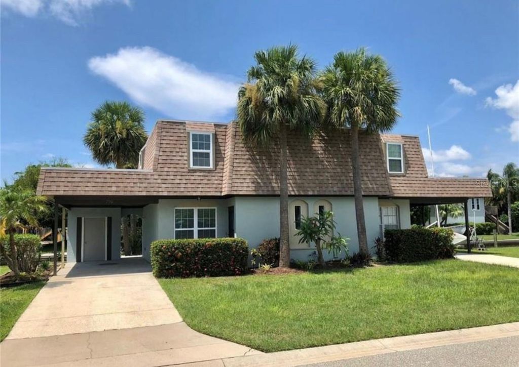 Photo of 779 Saint Judes Drive N, Longboat Key, FL 34228 (MLS # O6326464)