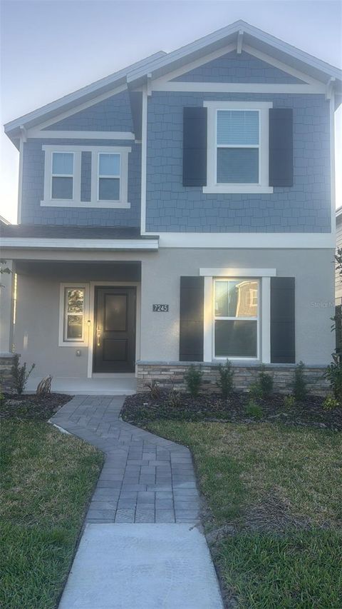 Photo of 7245 Sienna Oak Alley, Orlando, FL 32829 (MLS # O6401910)