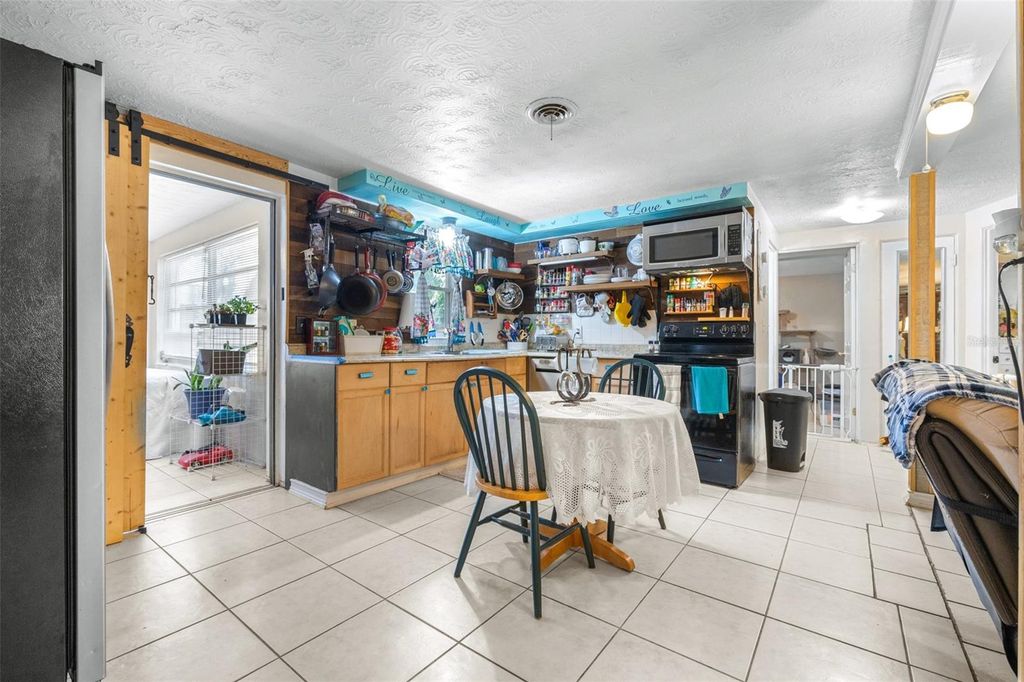 Photo of 7441 Cypress Drive, New Port Richey, FL 34653 (MLS # TB8399049)