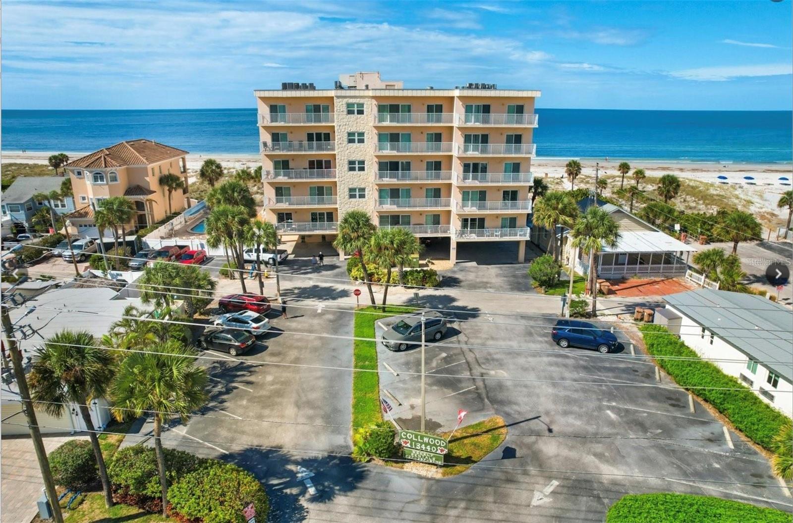 Welcome to Collwood 202, second-floor unit offering partial views of the Intracoastal Waterway and peaceful east-facing sunrises from the main living areas. Enjoy this peaceful gulf front area of Madeira Beach set back from Gulf Blvd.
Fully furnished with charming coastal décor, the condo features a spacious, open layout that’s perfect for personal use or weekly vacation rentals. Natural light fills the unit, creating a warm and inviting atmosphere throughout.
Collwood offers the ease of an on-site rental and management office, ideal for generating hassle-free rental income.
Community amenities include a newly renovated beachfront pool with modern glass fencing for unobstructed Gulf breezes, plenty of lounge seating, a BBQ grilling area, and shuffleboard. The secure, updated lobby with coded access leads to indoor corridors, offering easy access and weather protection year-round.