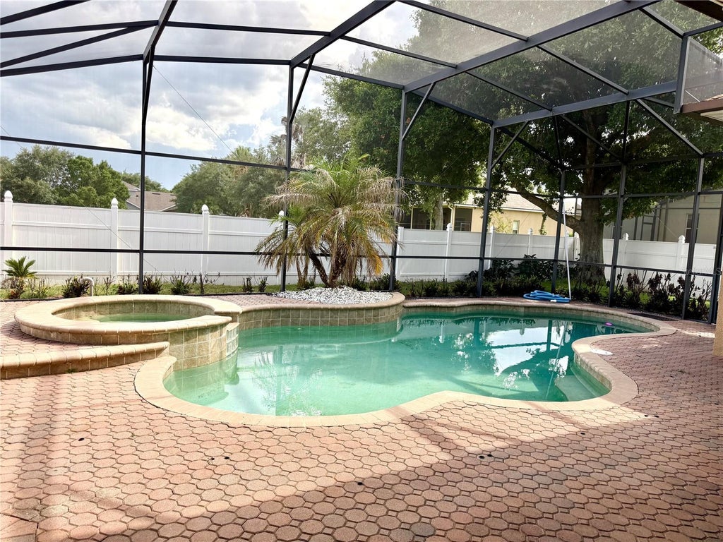 Photo of 4495 Harts Cove Way, Clermont, FL 34711 (MLS # O6427030)