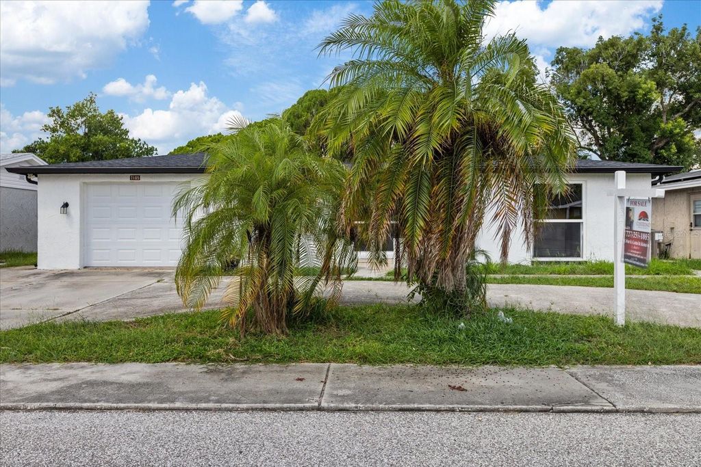 Photo of 7105 King Arthur Drive, Port Richey, FL 34668 (MLS # TB8467952)