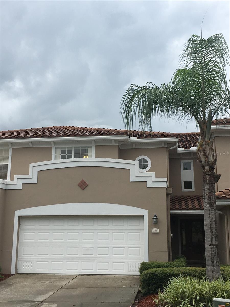 Extremely Spacious 3 Bedroom / 2.5 Bath / 2 Car Garage Townhouse in the Villas of Carrillon. Wood and Tile floors Downstairs and Carpet Upstairs. Master Bedroom Downstairs and Large Bonus Room Upstairs. Screened in Patio and Balcony overlooking Pond. Solid Wood Cabinets and Granite Counter tops Throughout. Washer & Dryer Included. Development Amenities include: Gated, Pool, Clubhouse. Rent includes: Water, Sewer, Trash, Landscaping. Laundry Room on First and Second Floor. Each Bedroom has a large, walk-in closet. 20' Ceilings in the Great Room and ceiling fans in all rooms. Conveniently located in Feather Sound area within minutes of Ulmerton, Publix, Retail, Restaurants, I 275.