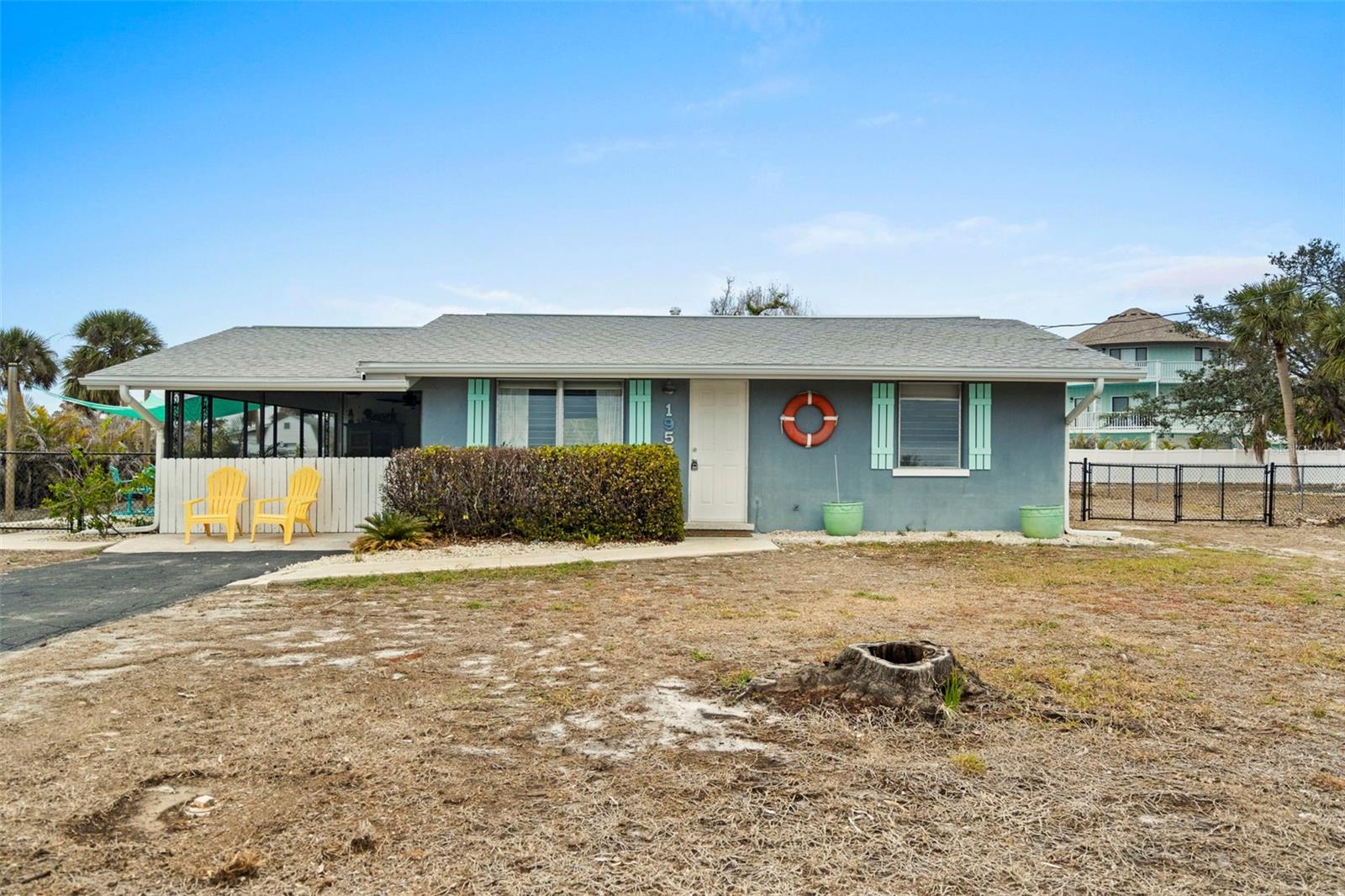 Come see this gorgeous, completely updated, two bedroom, 2 bath home with a newer air conditoner and water heater. This move in ready ranch home is located on an oversized lot with a DEEDED FLOATING BOAT SLIP. With such easy access to Lemon Bay and the Gulf of America, you will be liiving the Florida life the instant you move in. Stump Pass is just minutes away with no bridges to cross. The home boasts offers laminate flooring throughout and a large enclosed screened lanai to enjoy the outdoors. NO CARPET. The rear of the property offers a view of the canal and partial view of Lemon Bay. The home offers plenty of greenspace where you will find room for all your toys. Did I mention, there's a charging station for that Tesla, and plumbing and hookup for RV's. There is plenty room for a pool if you want. It also includes a large storage shed out back for additonal storage. This open floor plan is perfect for relaxing and entertaining. There are custom built-ins in all closets to maximize every inch of space you may need. In the great room, there are custom shelving for books and treasures you may want to store. This property also offers a fenced in yard for privacy or your pets. This home is centrally located to all of Englewood's best waterfront restaurants, boating, fishing, saltwater living, shopping and so much more. Just 5 miles to beautiful Manasota Beach, or stay home and walk to your dock just one lot away and take your boat or jump in your Kayaks to watch the sunset. Deeded boat slip has a parking space, where water and electricity are available. Schedule your private showing today and start living your best beach life TODAY.