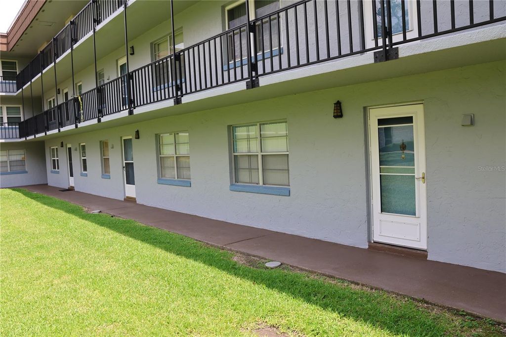 Photo of 333 Lake Howard Drive NW #103C, Winter Haven, FL 33880 (MLS # P4934760)