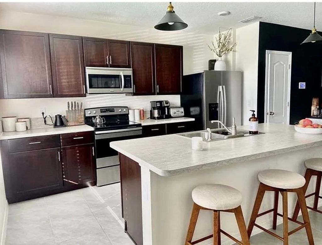 Photo of 1517 Southbury Drive, Kissimmee, FL 34744 (MLS # O6353356)