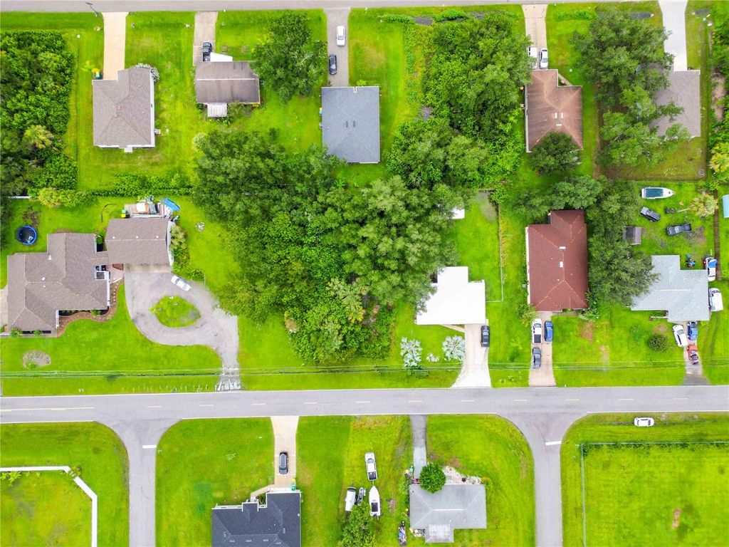 Photo of 1050 Birchcrest Boulevard, Port Charlotte, FL 33952 (MLS # O6339436)