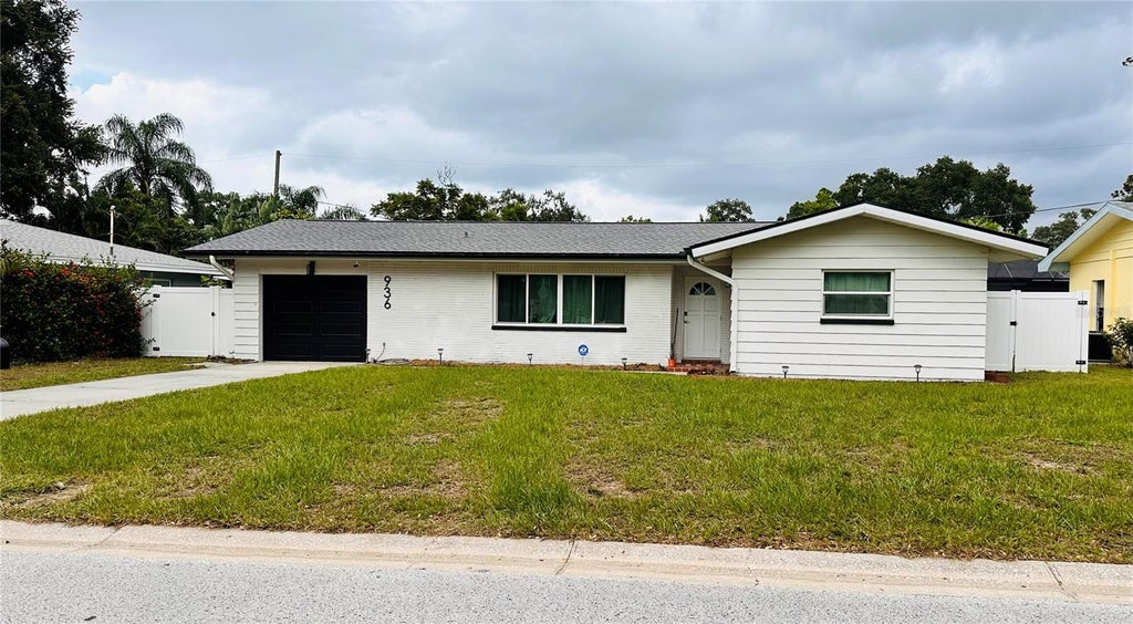Photo of 936 Lyndhurst Street, Dunedin, FL 34698 (MLS # TB8543309)