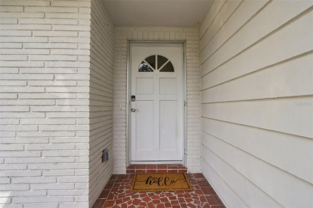 Photo of 936 Lyndhurst Street, Dunedin, FL 34698 (MLS # TB8543309)