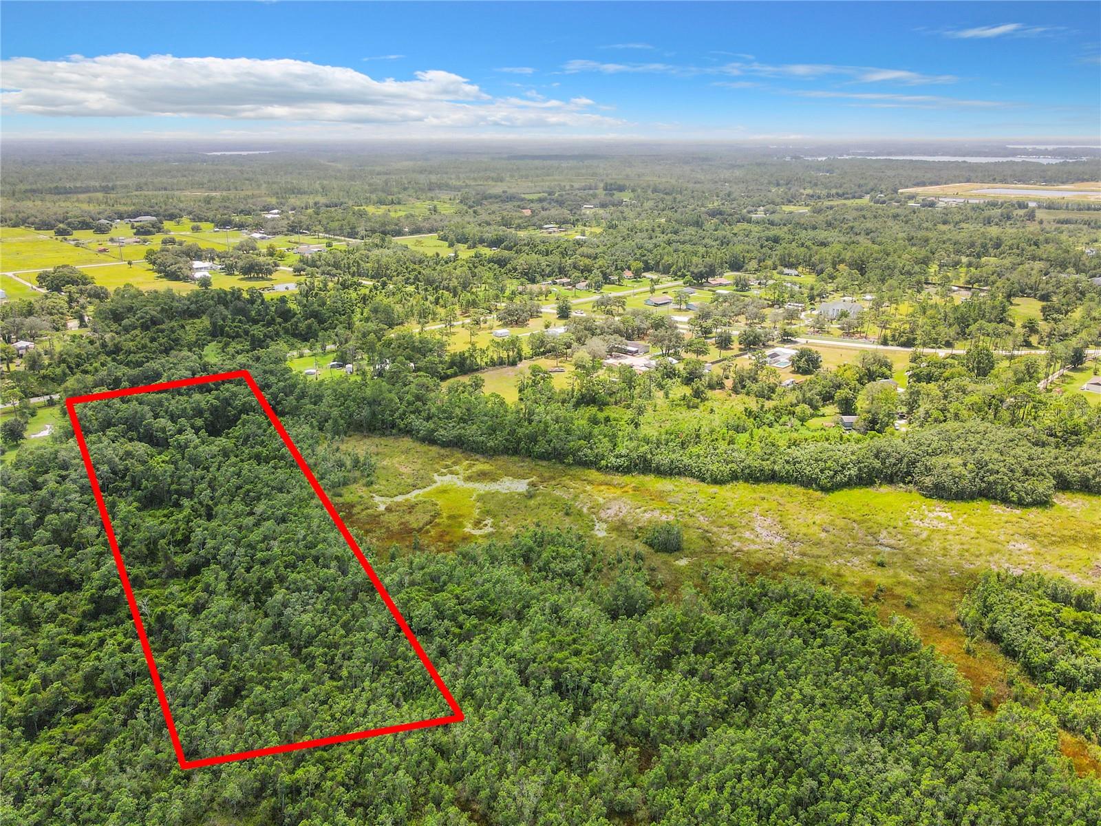 MAJOR PRICE REDUCED! SELLER HIGHLY MOTIVATED!
GREAT OPPORTUNITY! Discover a great opportunity to own 5.05 acre in the beautiful highly sought-after corridor of Saint Cloud. This expansive vacant land offers endless possibilities for development! Whether you're looking to build your dream home, establish a farm, or invest in a commercial project, this property provides the perfect canvas. The land allows for residential, agricultural, recreational, or even mixed-use purposes. Conveniently located with easy access to nearby amenities, this property holds incredible potential for various uses making it prime Real Estate at its finest. THE VALUE IS IN THE LAND & LOCATION!!! The Lot location is situated between 4 Major National Builder Subdivisions (Suncrest, Sunbridge, Wiregrass, Split Oak). This location would be perfect for Investors, Builders, and Developers. Also close to Lake Nona Medical City, VA Hospital, Shopping, Restaurants, Airports and Highways. Pleased See Attached Survey. Recent Landcover and Environmental Survey conducted on the property, however Buyer is encouraged to verify all measurements and details of the subject property. Zoning and Future Land Use needs to be verified/confirmed with Osceola County during Due Diligence period by Buyer and their Representatives.