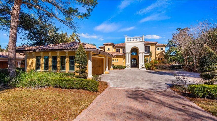 Step into the epitome of elegance at Villa Esperanza, a true crown jewel nestled in the prestigious Bella Collina community and honored as a Street of Dreams winner. This Tuscan-inspired masterpiece redefines luxury living with its seamless blend of architectural grandeur, impeccable craftsmanship, and stunning lakefront views over shimmering Lake Sienna.

From the moment you enter the dramatic volume foyer—adorned with hand-laid marble mosaics and exquisite faux finishes—Villa Esperanza enchants with its timeless beauty and sophistication. Spanning an impressive 11,049 square feet, this estate masterfully combines artistry with functionality at every turn. The living room captivates with intricate stonework surrounding a grand fireplace, while the dining room stuns with its arched brick ceiling, a nod to its authentic Italian design heritage.

At the heart of the home lies a chef’s dream kitchen, featuring striking granite countertops, a professional-grade Wolf gas stove, dual dishwashers, a Sub-Zero Pro 48 refrigerator, and a sprawling 20-square-foot island complete with integrated refrigeration. The family room adds a touch of charm and whimsy with its hidden built-in bookcase—an unexpected delight in this extraordinary home.

The first-floor primary suite is a sanctuary of luxury, stretching across an astounding 2,500 square feet. It boasts a private sitting room with a wet bar, a see-through stone fireplace, and breathtaking views of the lake and spa. The spa-like ensuite bath offers unmatched indulgence, with his-and-hers vanities, separate dressing areas, an eight-head double shower, and a Jacuzzi tub set beneath a romantic iron canopy.

Villa Esperanza is not only a masterpiece of design but also a marvel of modern technology. With state-of-the-art AI smart home automation powered by Josh.ai, you can control lighting, climate, entertainment, security, and more with simple voice or app commands. Whether you’re setting the mood, adjusting the temperature, or securing your home, luxury has never been so effortless.

Upstairs, the opulence continues with four additional primary suites, a Vegas-style game room, a fully equipped bar, and a state-of-the-art theater complete with a Home Cinema HDR10 4K wireless projector and plush seating. A one-bedroom, one-bath guest apartment provides privacy and comfort for visitors, while a private elevator ensures effortless access to all levels of the home.

Step outside to experience resort-style living at its finest. The expansive terrace is a haven for relaxation and entertainment, featuring a heated pool, spa, and a summer kitchen equipped with a Wolf gas fireplace—perfect for hosting gatherings or enjoying tranquil evenings by the lake.

Every inch of Villa Esperanza exudes opulence, offered fully furnished with imported luxury curtains, hand-painted Italian artwork, and thoughtfully curated finishes throughout. This six-bedroom, seven-full and four-half bathroom estate is more than just a home—it’s a legacy of refined living.

Discover the magic of Villa Esperanza. Schedule your private tour today and see why this Street of Dreams winner is the pinnacle of Bella Collina’s luxury lifestyle.