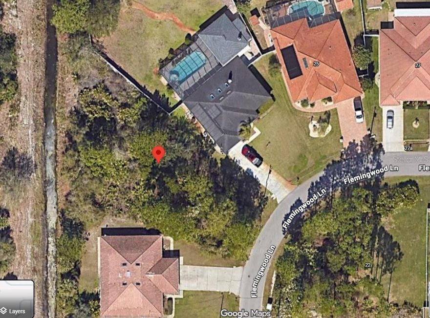 Build your dream home on this spacious 15,333 sq ft residential lot located in the desirable  Palm Coast . Situated in an established neighborhood with existing homes already built, this property offers a peaceful setting on a quiet street with natural surroundings. Plenty of room to design a custom home with space for a pool, outdoor living area, and more. Conveniently located near schools, shopping, dining, and major roadways. Don’t miss this opportunity to invest or build in a growing community.