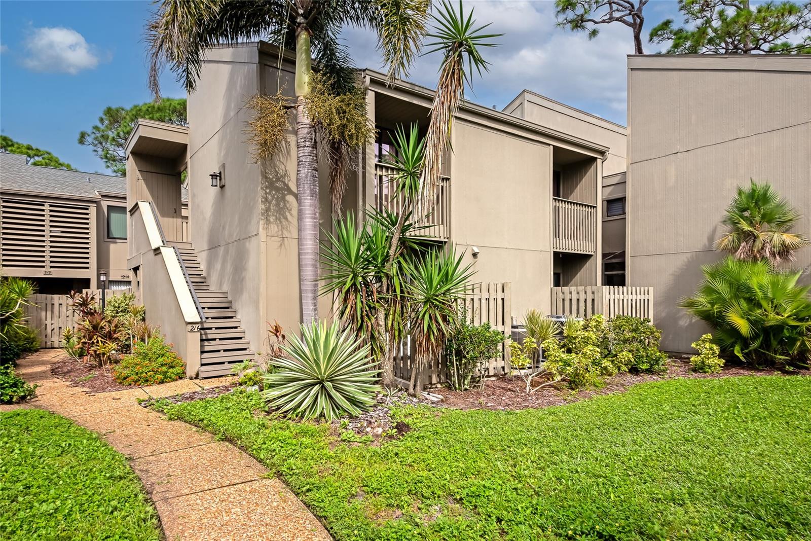 New price makes this a fantastic buy! Looking for an active lifestyle community close to the Intercoastal? Pine Run is the perfect location! Conveniently located between Sarasota and Venice in Osprey, this community is within close proximity of the famed Casey Key Fish House and Tiki Bar, plus many other restaurants, shopping areas, public boat launch, park and so much more! The Legacy Trail is also nearby! Pine Run offers two swimming pools, a small club house with fitness room, pickle ball and tennis courts, all in a wooded setting. Now about this condo! Location Location Location within Pine Run is superior! Nestled among wooded surroundings and close to the walking path leading to the main pool, clubhouse and pickleball and tennis courts. You will enjoy your time on the lanai overlooking the tranquil grounds. This 2nd floor condo has been updated with a new kitchen with quartz counter tops and new stainless steel appliances. The A/C is brand new in 2025! Each of the two bedrooms have their own private balcony. The master suite with full bath, plus two closets! The living room and dining room feature sliding glass doors that lead to the screened balcony. The laundry closet is located in the kitchen and dinette area with washer and dryer included. There is a carport with one designated parking spot. Two exterior storage units! Pine Run is an active community with much to offer. Come take a look at this well maintained condo today!