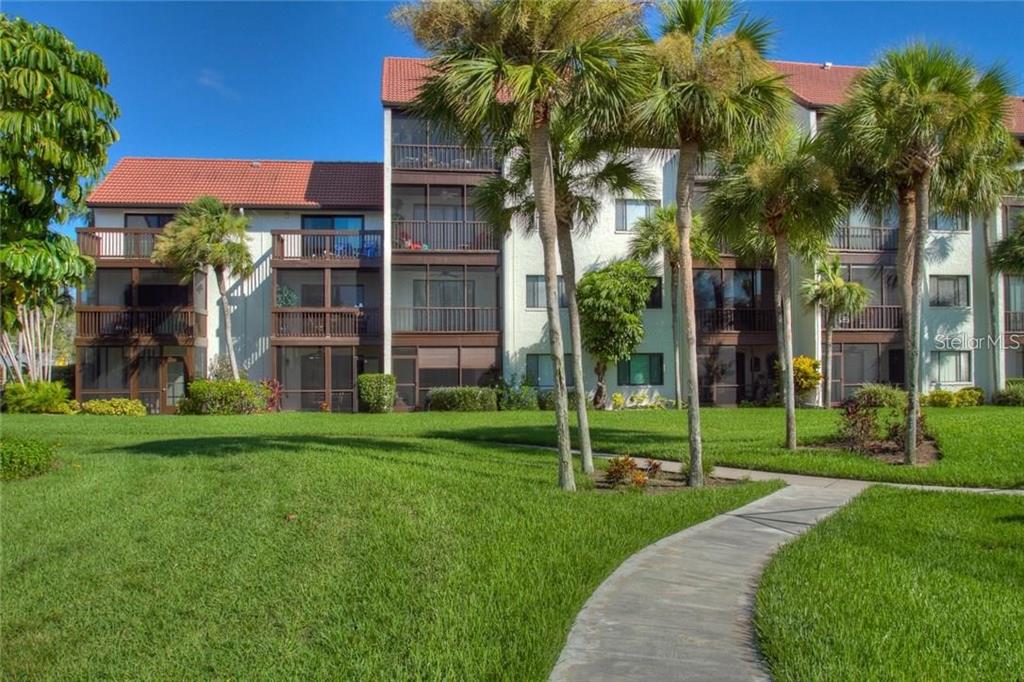 View the intracoastal by SIESTA KEY from your master bedroom porch having a rest on the reclining chairs. This second floor townhouse is in the perfect location for your stay in SARASOTA and a short distance from a world famous beach. Located by the Stickney Point Bridge this renovated and beautifully decorated townhouse is ready for short term stays of a minimum of one month. Up the stairs to the front door and step into this light filled home, all up to date decorating in neutral tones. There is a guest bathroom on the first floor and an extra single bed for overflow guests. Up to the bedroom level and you will find two bedrooms, the master has a king sized bed and the second bedroom features a queen sized bed. There are two porches for relaxing on, one off the living room and one off the master bedroom. There is a washer and dryer in the unit, and the resort style complex features two swimming pools, one overlooking the bay and tennis courts. SARASOTA, NEAR SIESTA KEY, RENTAL.