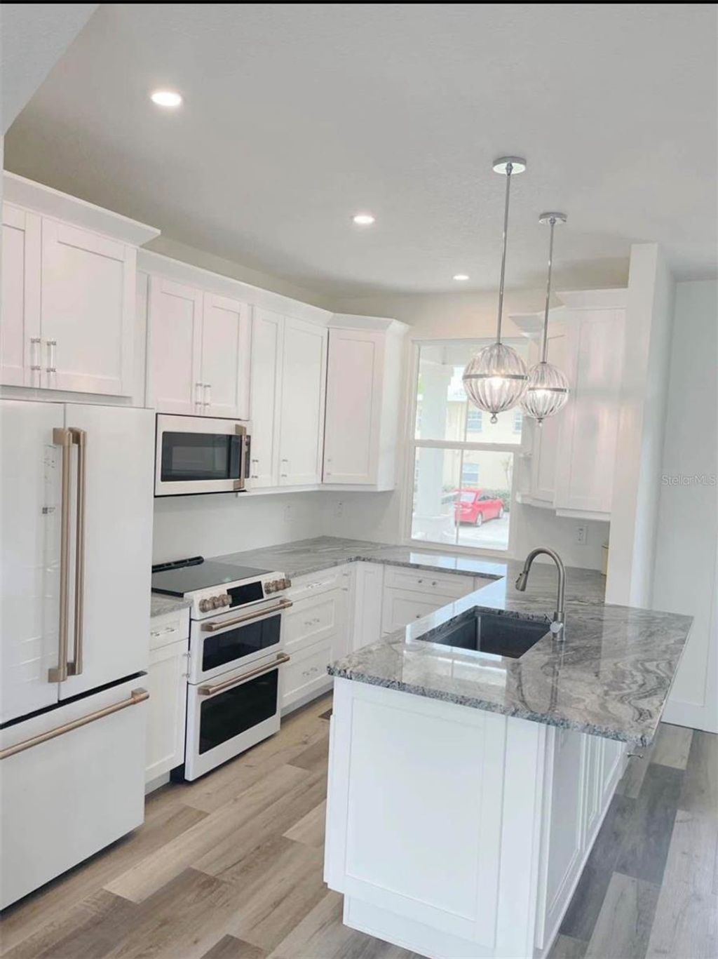 Photo of 1299 5th Street S, St Petersburg, FL 33701 (MLS # TB8473861)