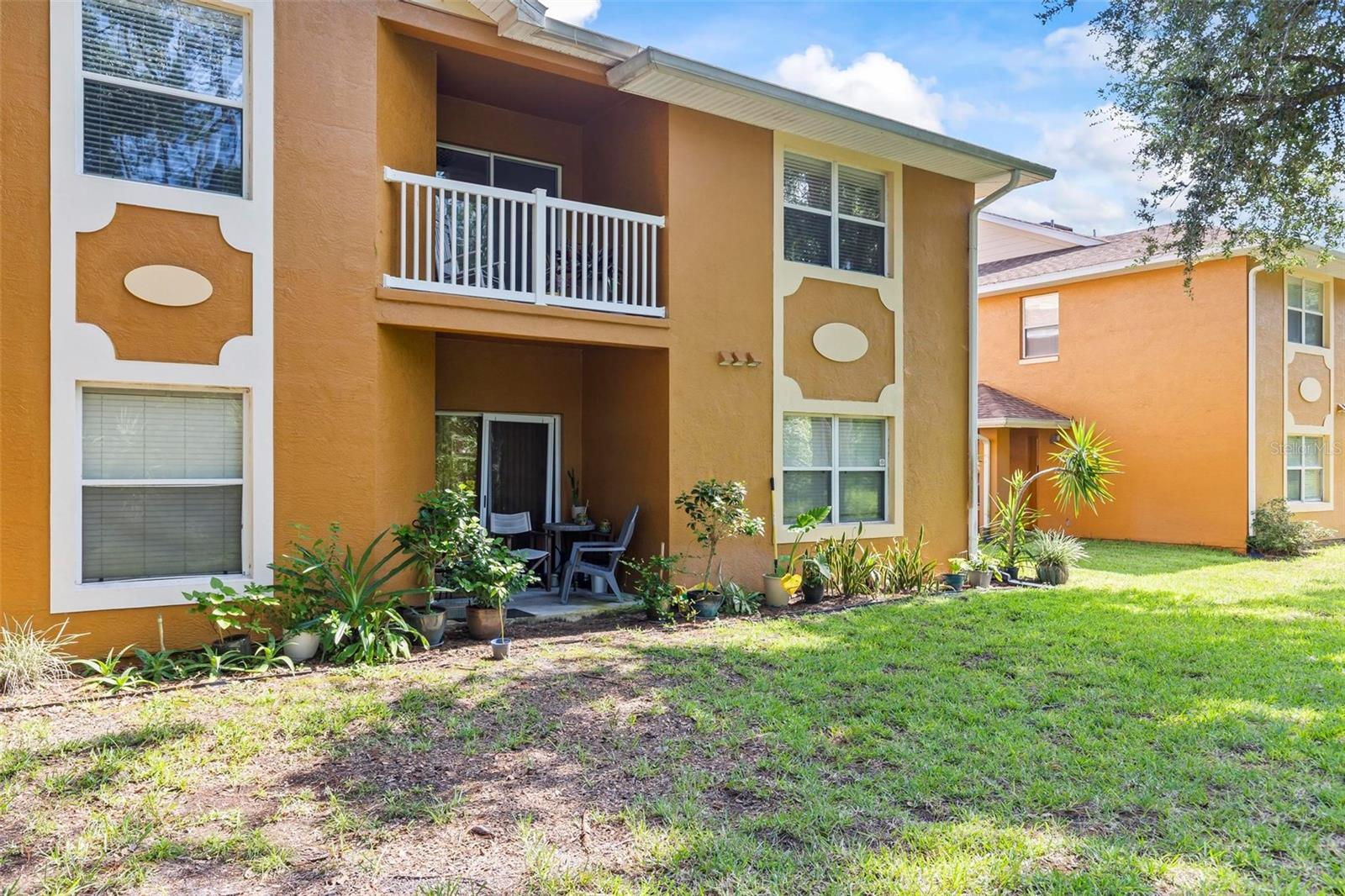 Welcome to Palm Pointe! This well-maintained 2nd floor condo is ideally located on the border of Palm Coast and Bunnell. Offering 2 bedrooms and 2 bathrooms, this unit features vinyl flooring throughout, a modern kitchen with granite countertops and new appliances, and a private rear balcony with serene views. The staircase is equipped with a stair climber for added convenience (can be removed if desired). Washer and dryer included. Palm Pointe is a gated community with access to a pool, clubhouse, and internet service is included. Conveniently located near shopping, dining, and easy access to both Palm Coast and Bunnell amenities. Don't miss this opportunity for easy living in a fantastic location!